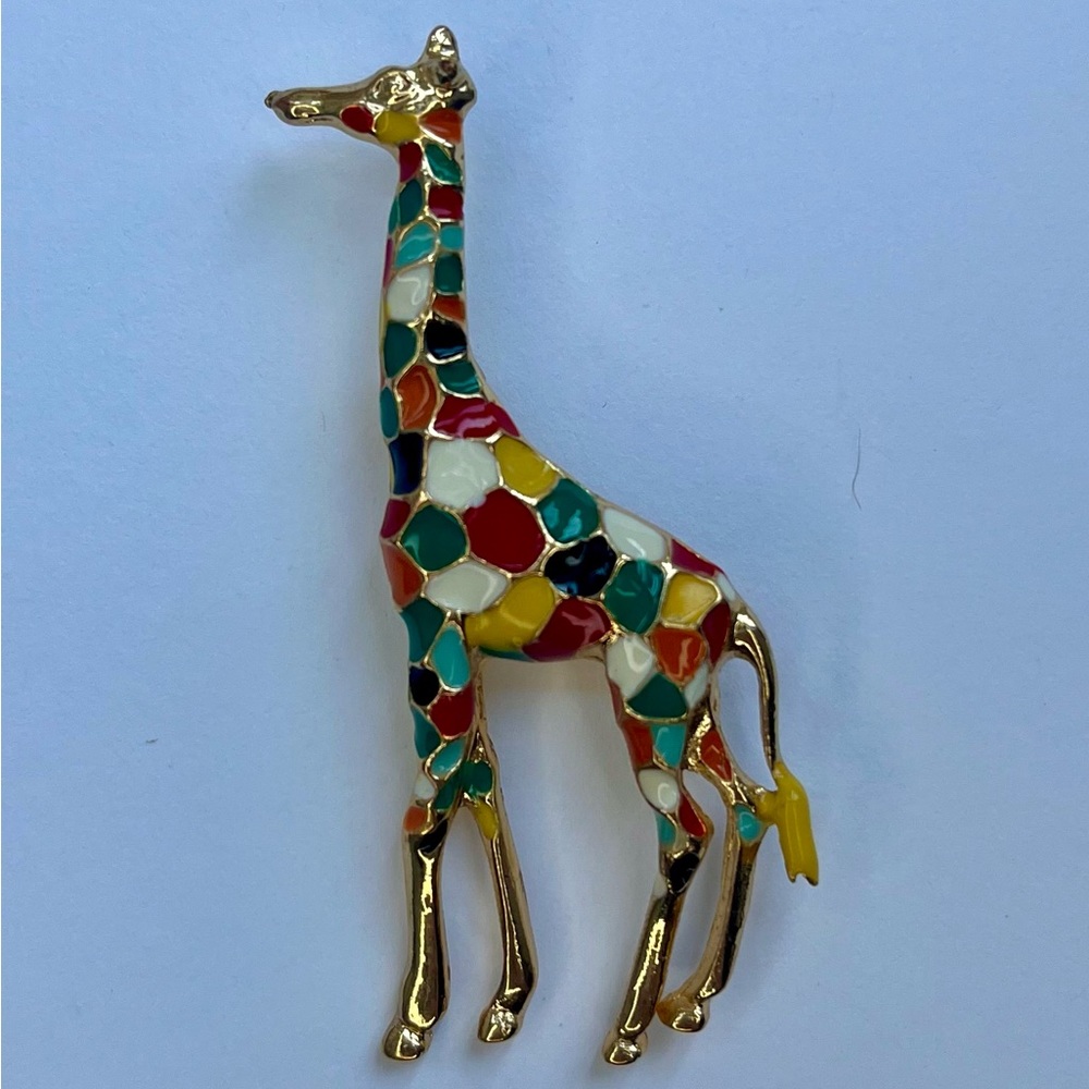 Vintage gold giraffe pin with multicolored painted spots 2 inches tall